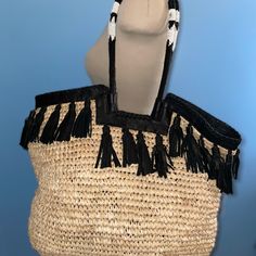 New W/O Price Tag Is An Overstock Outlet (Has Black Line Going Thru Black Leather Label To Prevent Store Return) Authentic Cleobella Tote - Straw Woven Tote With Black Leather Tassel Detailing And Black Leather Trim. Has Black And White Glassed Beaded Handles - Snap Magnetic Closure - Measures Approx. 19" W X 14" H X 6" D - Original Dust Bag Military Messenger Bag, St Germaine, Burberry Quilted Jacket, Green Tote Bag, Green Tote, Crochet Tote Bag, Leather Label, Vintage Burberry, Crochet Tote