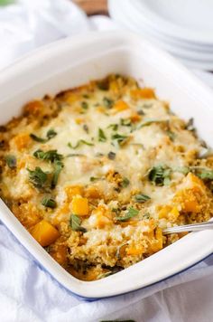 a casserole dish with cheese and vegetables in it is ready to be eaten