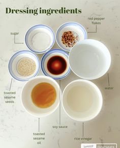 the ingredients for dressing are shown in bowls