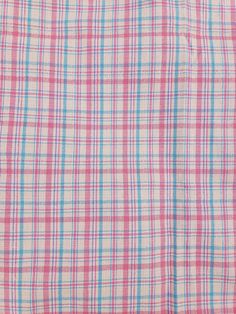 a pink and blue checkered shirt