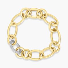 Indulge in luxury with this extravagant piece by Roberto Coin. The Diamond Alternating Link Chain Bracelet in 18K Yellow Gold exudes an aura of opulence. It is crafted with linking chains of yellow gold and a single white gold link that is embellished with diamonds. It is impossible to go unnoticed when you wear this bracelet to any event. Luxury Link Bracelet With Chunky Chain, Elegant White Gold Bracelet With Chunky Chain, Luxury Chunky Chain Bracelet, Elegant Diamond Jewelry With Chunky Chain, Yellow Gold Diamond Bracelet With Rectangular Links, Yellow Gold Diamond Bracelets With Rectangular Links, Luxury Chunky Chain Bracelet Jewelry, Luxury Diamond Oval Link Bracelets, Diamond Link Gold Bracelet Fine Jewelry