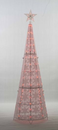 Light up your Hoilday with this 72" Color changing LED Glittering Snowflake Cone tree sculpture. INDOOR/OUTDOOR USE, This sculpture is made with K/D constuction, and coated metal with glittering snowflake.60" Lead wire, with 115 PCS color change LED bulbs. Metal Stakes included. EverStar 72-in Tree Yard Decoration with Clear LED Lights | ES-67004 Cone Trees, Tree Sculpture, Tree Ideas, Color Changing Led, Outdoor Christmas Decorations, Outdoor Christmas, Yard Decor, Led Bulb, Color Change