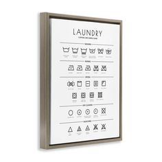 a framed poster with laundry symbols on it