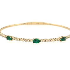 With a stunning design, this 14K yellow gold flex bangle style bracelet offers the warm tones of yellow gold and shimmering diamonds (.30cts). The subtle feature of this bangle is its gorgeous deep oval emerald stations. Bangle features 5 emeralds (1.12ctw). Elegant Oval Green Bangle, Elegant Green Oval Bangle, Diamond Cuff Bracelet, Pearl Bracelet Gold, Diamond Fashion Rings, Bangles Style, Sterling Silver Hoop Earrings, Sterling Silver Necklace Pendants, Mens Jewelry Bracelet