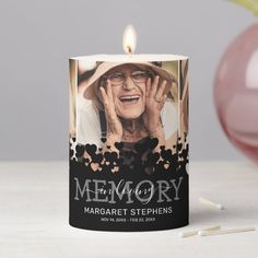 a candle that has a photo on it