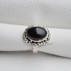 Gemstone-Black Onyx Shape-Oval Stone Size- 10x14 MM Metal-925 Sterling Silver This One of a kind ring is adorned with beautiful Black Onyx gemstone in sterling silver.Black Onyx is the birthstone representing the month of December. About gemstone- Black Onyx is the birthstone for Leo. It is the stone of protection.This elegant smooth textured stone is said to have immense healing and spiritual benefits.Black Onyx symbolizes peace,harmony and love and good luck.Black Onyx is well known to remove Black Oval Cabochon Jewelry For Anniversary, Black Sterling Silver Cabochon Ring, Black Cabochon Sterling Silver Ring, Anniversary Black Cabochon Rings, Black Sterling Silver Jewelry With Oval Cabochon, Black Oval Cabochon Sterling Silver Jewelry, Birthstone Promise Rings, December Birthstone Ring, Handmade Silver Ring