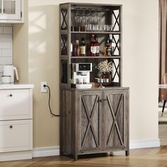 a wooden cabinet with wine glasses on it