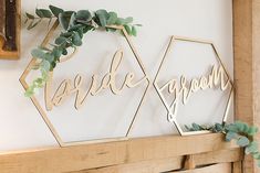 two wooden hexagons with the word bride and groom cut out on them