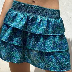 Brand New Unused Women’s Mini Skirt With Shorts Under Turquoise Skirt, Tags Included, Very Flowy And Comfortable Blue Stretch Ruffle Skort, Beach Stretch Mini Skirt With Ruffles, Blue Ruffled Stretch Skort, Beach Mini Skirt With Ruffles And Stretch, Blue Ruffled Skirt Bottoms For Beach, Green Ruffled Bottoms For Day Out, Blue Ruffled Skort For Beach, Blue Skirted Bottoms With Ruffles, Skirted Blue Bottoms With Ruffles