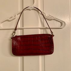 Ann Taylor Burgundy Embossed Leather & Suede Mini Handbag New Without Tags - Never Used Leather Beautiful Burgundy-Wine Colored Mini Bag. One Side Is Croc Embossed Leather, The Other Side Is Soft Suede. Leather Handle And Piping, Suede Carries Through On Sides. Silver Hardware. Approx Size: Height: 4-1/2" Width: 9" Depth: 1-1/2" Strap Drop: 7" One Interior Zip Pocket Red Clutch Shoulder Bag With Zipper Closure, Red Clutch Bag With Zipper Closure, Wicker Purse, Sequin Bag, Bow Bag, Quilted Handbags, Mini Handbag, Burgundy Wine, Black Leather Handbags