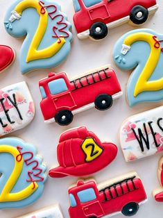 decorated cookies are arranged in the shape of numbers and vehicles for children to learn how to decorate