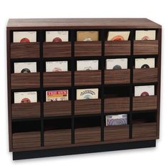 a bookcase with many different types of cards and folders on it's sides