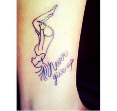 a woman's leg with a tattoo on it that reads, merry give up