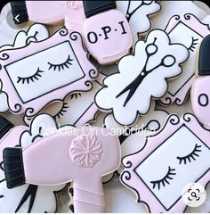 decorated cookies with eyelashes and frames on them