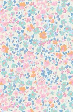 an image of a flowery pattern on a wallpaper with blue, pink and orange flowers