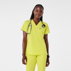 Official FIGS® Scrubs. Ridiculously Soft Scrubs Designed Just For You. Get Free Shipping On Orders $50+! | FIGS Womens Serving Lime Catarina - One-Pocket Scrub Top™ Figs Scrubs, Jogger Set, Scrub Tops, Fig, Scrubs, Casual Pants, Slim Fit, V Neck, Pants