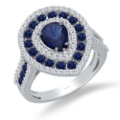 A halo of bright blue sapphires is bordered by a contrasting edge of white diamond accents to create a delightfully sweet and feminine look. Blue Halo Ring With Diamond Accents Round Cut, Blue Halo Ring With Diamond Accents, Fine Jewelry Pear-shaped Sapphire Ring With Halo Setting, Pear-shaped Sapphire Ring With Halo Setting, Blue Cluster Diamond Ring With Halo Setting, Cluster Sapphire Diamond Ring With Halo Setting, Sapphire Diamond Cluster Ring With Halo Setting, Blue Halo Ring In Fine Jewelry Style, Fine Jewelry Blue Halo Ring