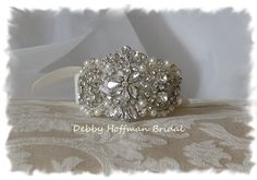 "MADE TO ORDER! Each piece is individually handmade to order. Please read my policies page and shop announcement, at the top of my homepage for current production time prior to placing your order. http://www.debbyhoffmanbridal.etsy.com Beautiful vintage inspired cuff bracelet made with high quality, genuine crystal rhinestones and soft white pearls embellishment that I have carefully hand sewn onto double faced white, off-white (diamond white), bridal white (light ivory), ivory, blush, champagne Adjustable Rhinestone Cuff Bracelet For Weddings, White Rhinestone Bracelets For Wedding, Wedding Cuff Bracelet, Bridal Cuff Bracelet, Bridal Cuff, Pearl Bracelet Wedding, Mother Of Bride Outfits, Wedding Cuff, Bride Outfits