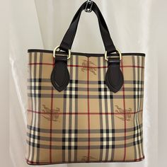 Nova Check Pvc Leather Medium Tote Bag. Never Used. Comes With Card And Dust Bag Burberry Haymarket Tote, Designer Brown Satchel For Shopping, Classic Brown Bag With Dust Bag, Brown Coated Canvas Bag For Errands, Designer Brown Tote Shoulder Bag, Beige Coated Canvas Business Bag, Business Beige Coated Canvas Bag, Burberry Tote Bag, Burberry Tote