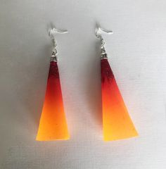 "Handmade Long Earrings Geometric Multicolor Earrings Orange Red Bright color Glitter Bell Earrings Cone Earrings Drop Earrings Gift for girl Warning Copying our products or designs may constitute misappropriation of intellectual property.  They may not be duplicated, copied or reproduced. Original author's work. Copying is Prohibited. All Products are Copyrighted. ©2022 Modern handmade earrings, unique contemporary design. Original unique author's work accessory for creative women. Decorative j Adjustable Red Earrings For Party, Glitter Red Earrings For Gifts, Red Glitter Earrings For Gift, Multicolor Glitter Drop Earrings, Multicolor Glitter Dangle Earrings, Red Party Earrings With Ear Wire, Orange Resin Jewelry For Party, Orange Dangle Earrings For Party, Party Earrings With Resin Ear Wire