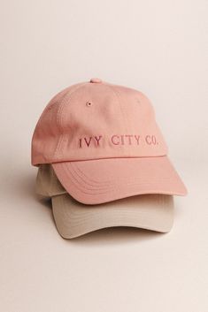 Introducing the first ever Ivy MERCH! We've poured our hearts and souls into these darling hats and hope you love them as much as we do! Available in our signature Ivy pink and a beautiful shade of sage, featuring our classic embroidered logo. And did we mention there's a matching mini version?! Classic Pink Hat With Curved Brim, Pink Fitted Hat With Flat Brim, Pink Fitted Hat With Curved Brim, Classic Spring Trucker Hat With Curved Brim, Pink Cotton Hat With Curved Bill, Pink Everyday Hat For Spring, Pink Cotton Curved Bill Hat, Classic Adjustable Pink Hat, Classic Curved Bill Hats For Spring