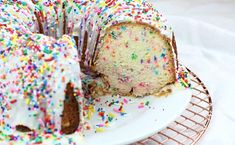 a bundt cake with sprinkles on a plate