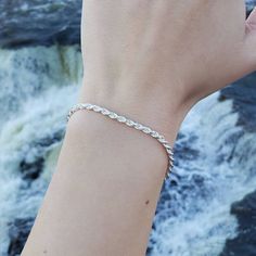 The Rope Bracelet is a beautiful everyday style that looks great on its own or stacked with another bracelet.  - Made of solid .925 Sterling Silver (not plated) - Excellent quality, Italian-made. - Pictured here with the Snake Ball Bracelet! (Sold separately). - 2.6 mm thick. Anklet available: https://snazzystonesjewelry.etsy.com/listing/1434817159 Necklace available: https://snazzystonesjewelry.etsy.com/listing/1317965058       - - - - - - - - - Looking for a different thickness? 1.8 mm thick b Silver Chain Style, Ball Bracelet, The Snake, Chain Link Bracelet, Beautiful Bracelet, Delicate Bracelet, Solid 925 Sterling Silver, Link Bracelets, Chain Link