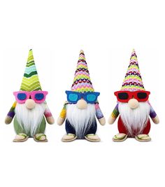 three gnomes with sunglasses and hats on