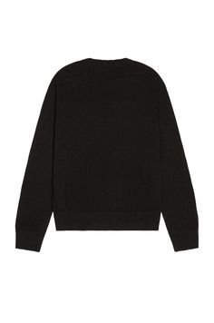 Find SAINT LAURENT Crew Neck Sweater on Editorialist. Saint Laurent Crew Neck Sweater in Black 100% cashmere. Made in Italy. Hand wash. Lightweight knit fabric. Rib knit trim. SLAU-MK27. 603089YALL2. About the designer: SAINT LAURENT has been influencing and revolutionizing the fashion industry since the debut of its iconic ‘Rive Gauche’ collection in 1966 - the couture house was the first to create a ready-to-wear capsule. The sleek, precisely tailored staples, like the signature biker jackets, transcend seasons and trends. Creative Director Anthony Vaccarello continues to honor the label’s illustrious reputation by reintroducing cult styles, including the ‘Lou’ handbag and ‘Tribute’ sandals. Black Relaxed Fit Cardigan With Ribbed Cuffs, Classic Black Cashmere Cardigan, Designer Black Sweater With Ribbed Cuffs, Black Crew Neck Fine Knit Cardigan, Designer Long Sleeve Cashmere Sweater, Designer Long Sleeve Cashmere Tops, Luxury Black Wool Top, Classic Black Fine Knit Cardigan, Black Merino Wool Cardigan With Ribbed Cuffs