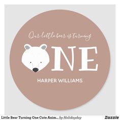 a sticker that says, our little bear is turning one