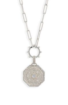 Geometric moonstones draw inspiration from the ornate beauty of antique treasures on this octagonal medallion pendant suspended from a sterling silver paper-clip chain. 18" length Handcrafted Sterling silver/moonstone Made in Canada Silver Pendant Medallion Necklace With Polished Finish, Silver Medallion Pendant Necklace Amulet Style, Silver Intricate Medallion Necklace, Silver Amulet Pendant Medallion Necklace, Luxury Tarnish-resistant Sterling Silver Medallion Necklace, Silver Paper, Keep Jewelry, Moon Stone, Paper Clip