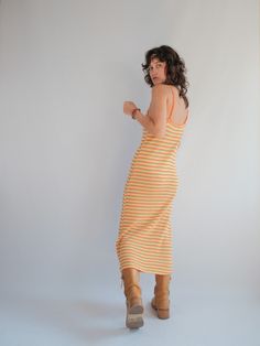 Yellow and Orange Stripe Knitted Maxi Slip Dress  Really fun colours and great fit due to the weight of the knit.  Perfect little summer dress.  Cotton Poly Blend  Tag size S Very Good second hand condition, minor wear to be expected of any second hand item. Casual Ribbed Midi Dress For Beach, Summer Ribbed Dresses For Day Out, Summer Beach Knit Midi Dress, Knit Midi Dress For Beach In Summer, Casual Ribbed Summer Midi Dress, Knit Midi Dress For Summer Vacation, Striped Knit Beach Dresses, Striped Knit Dresses For The Beach, Casual Ribbed Maxi Dress For Beach