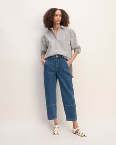 The shape of things to come. Made of regenerative cotton denim with just a touch of stretch, the Utility Barrel Jean is complete with a waist-nipping high rise, a cool curved leg, and an easy cropped length. Plus, it has utilitarian details, like accent stitching and patch pockets for a craftsman-inspired look. Modern Cropped Jeans With Relaxed Fit For Work, Modern Relaxed Fit Cropped Jeans For Workwear, Modern Relaxed Fit Cropped Jeans, Modern Cropped Jeans With Relaxed Fit And Tapered Leg, Spring Workwear Jeans With Cargo Pockets, Versatile Cropped Jeans With Relaxed Fit, Modern Workwear Cropped Jeans With Straight Leg, Casual Workwear Cropped Jeans With Patch Pockets, Spring Workwear Cropped Jeans With Tapered Leg