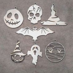 halloween ornaments are arranged on a gray surface