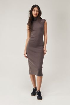 Knit into it. Feel confident in our knit midi dress, made in high quality knit fabric, with a stellar figure hugging fit and a timeless high neck design. The dress features modest capped sleeves, a sleek midi length that drops to the knees, a flattering tight fit and a practical slit at the back. Style with boots and a leather jacket for a look that will take you from the office to after work dinner and drinks, no matter the weather. Knit Midi Dress High Quality Knit Fabric Flattering Bodycon Silhouette Stellar Midi Length Sliit Back Detailing Model wears a size S (US size 6/UK size 10). Springtime Dresses, Spring Dresses For Women, High Neck Designs, Sleeveless Midi Dress, Dresses 2024, Knit Midi Dress, Midi Dress Sleeveless, Spring Dresses, Dresses For Women