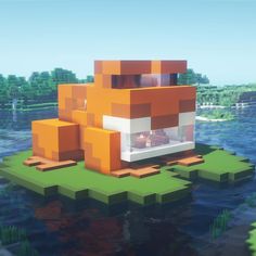 an orange and white house floating on top of water