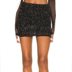 Brand New, Never Worn, Black Mini Sequin Skirt, Tag Says Size 10 But Fits Like Size 6, Has Stretch, Zip Back Closure, Extra Sequins. Maybe Missing Sequins(See Last 2 Photos Same Spot, Up Close/At Distance). Not Noticeable. Full Lined. Length 15” Waist 14.5” Stretches To 17” Hem 18” Evening Mini Skirt Skort, Fitted Denim Skirt For Night Out, Fitted Sequined Bottoms For Cocktail, Fitted High Waist Skort For Night Out, Fitted Mini Skirt For Date Night And Party Season, High Waist Mini Skirt For Summer Evening, Black Glamorous Mini Skirt For Evening, Black Mini Skirt For Evening Parties, Black Mini Skirt For Evening Party Season