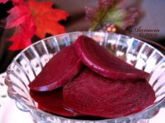 sliced beets in a glass bowl on a table