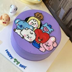 there is a cake with cartoon characters on it