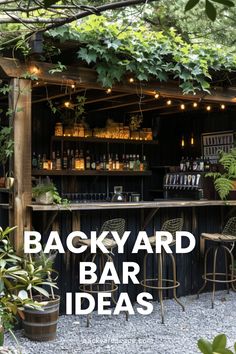 an outdoor bar with lights and plants surrounding it, surrounded by greenery that reads backyard bar ideas