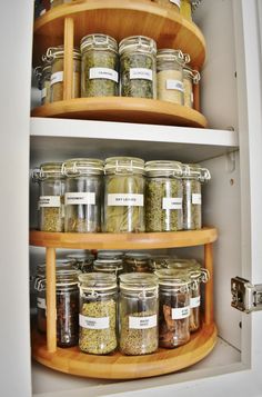 an organized pantry filled with spices and herbs