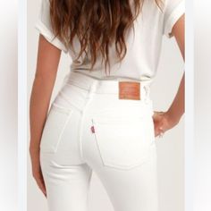 Women’s Levi’s 501 Button Fly, Raw Hem, Distressed Knees, High Rise, Straight Leg, White Fitted Levi's Jeans With Buttons, White Casual Jeans With Buttons, Casual White Jeans With Buttons, White Buttoned Casual Jeans, Classic White Levi's Bottoms, White High Rise Jeans With Buttons, White High-rise Jeans With Buttons, Trendy White Jeans With Buttons, White Fitted Levi's Jeans