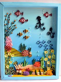 an underwater scene made out of paper with fish and corals on the bottom, under water