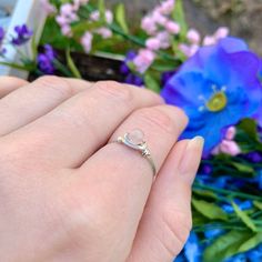 💓Wire Wrapped Rose Quartz Crystal Ring - 1 Ring💓*these beads are a little more pink than the photo captures, it was hard to capture in this lighting This ring features a natural (not dyed) tiny 4mm rose quartz crystal bead, wrapped in your choice of wire. The options are silver plated, copper, bronze, black, or gold colored wire. All except the silver plated have a non tarnish coating so they will never oxidize or change color. Being careful to not wear your rings while showering or washing yo Stackable Rose Quartz Jewelry For Gifts, Pink Moonstone Jewelry Gift, Pink Sterling Silver Moonstone Promise Ring, Pink Rose Quartz Hand Wrapped Jewelry, Hand Wrapped Rose Quartz Pink Jewelry, Hand Wrapped Pink Rose Quartz Jewelry, Rose Quartz Crystal Ring For Promise, Silver Rose Quartz Crystal Ring, Promise Ring With Rose Quartz And Gemstone Detail