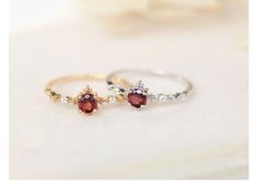 Holiday Notice: We will be on holiday from Feb 6 to Feb 15 for the Spring Festival. Orders will be shipped after we resume work. Natural Garnet Ring Silver, Red Garnet Engagement Ring, Vintage Promise Ring Gold, Red Gemstone Ring, Anniversary Ring, Mother's Day Gifts Features * Made to Order. * Material: 925 Silver with Gold Plated * Custom Gold Color: Yellow Gold, White Gold * Main Stone: Natural Red Garnet * Shape: Round Shape * Size: Around 4*4 mm * Ready to Ship in 7-15 Business Days Want to Promise Ring Gold, Vintage Promise Ring, Gold Minimalist Ring, Red Gemstone Ring, Promise Rings Vintage, Garnet Ring Silver, January Birthstone Rings, Garnet Engagement Ring, Moon And Star Ring