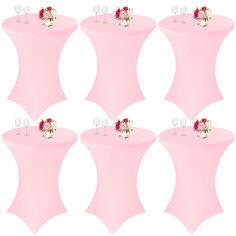 six pink tables with wine glasses and flowers on them