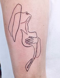 a woman's leg with a line drawing on it