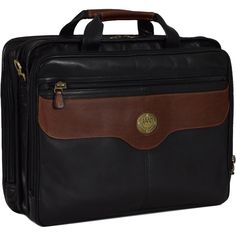 The "Do It All" Stay organized and stress-free on your business trips with the Traveler Briefcase. Featuring three zippered compartments, a pull-out laptop sleeve with handle which creates room for larger laptops, and a reinforced design, this versatile briefcase is perfect for work or travel. With a removable shoulder strap and functional organization panel, carry all your essentials, including 13" laptops, with ease. Plus, the carry on slip through system makes it a breeze to navigate through Functional Organization, Briefcase For Men, Easy Travel, Computer Case, Leather Briefcase, Stay Organized, Business Travel, Black Tan, Laptop Sleeve