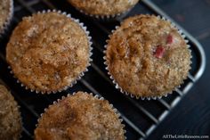 several muffins cooling on a wire rack