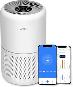 an air purificater and smartphone next to it on a white background